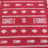 Handmade red and white carpet