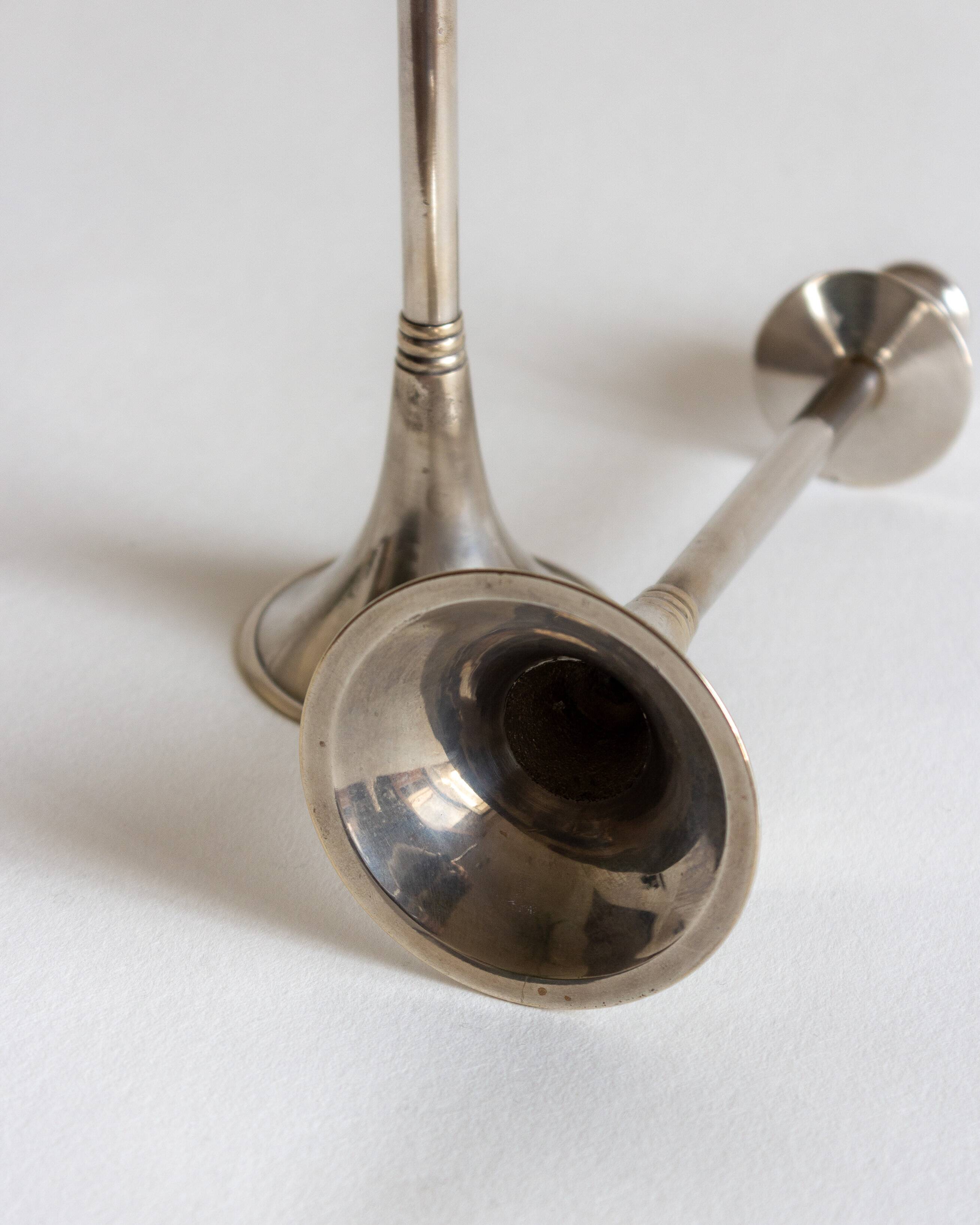 Duo of silver-plated brass candlesticks, 1950s/1960s