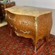 Louis XV chest of drawers, cubed rosewood marquetry, gilded bronzes, veined marble.
