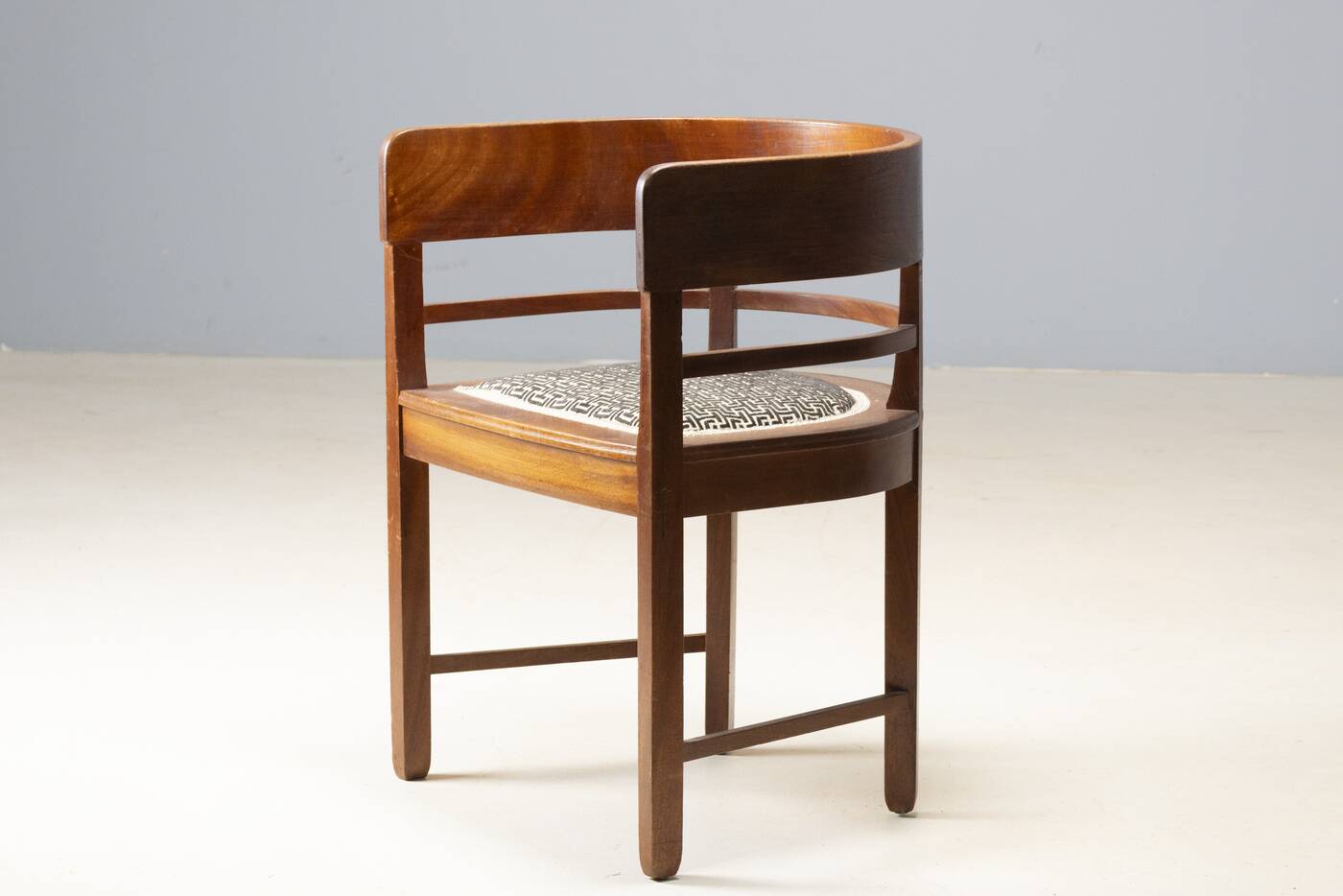 Central European armchair from the early 20th century with an inlaid backrest.