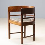 Central European armchair from the early 20th century with an inlaid backrest.