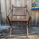 Teak and cane folding chair from the 1900s