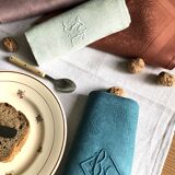 Set of four napkins dyed in multiple colors