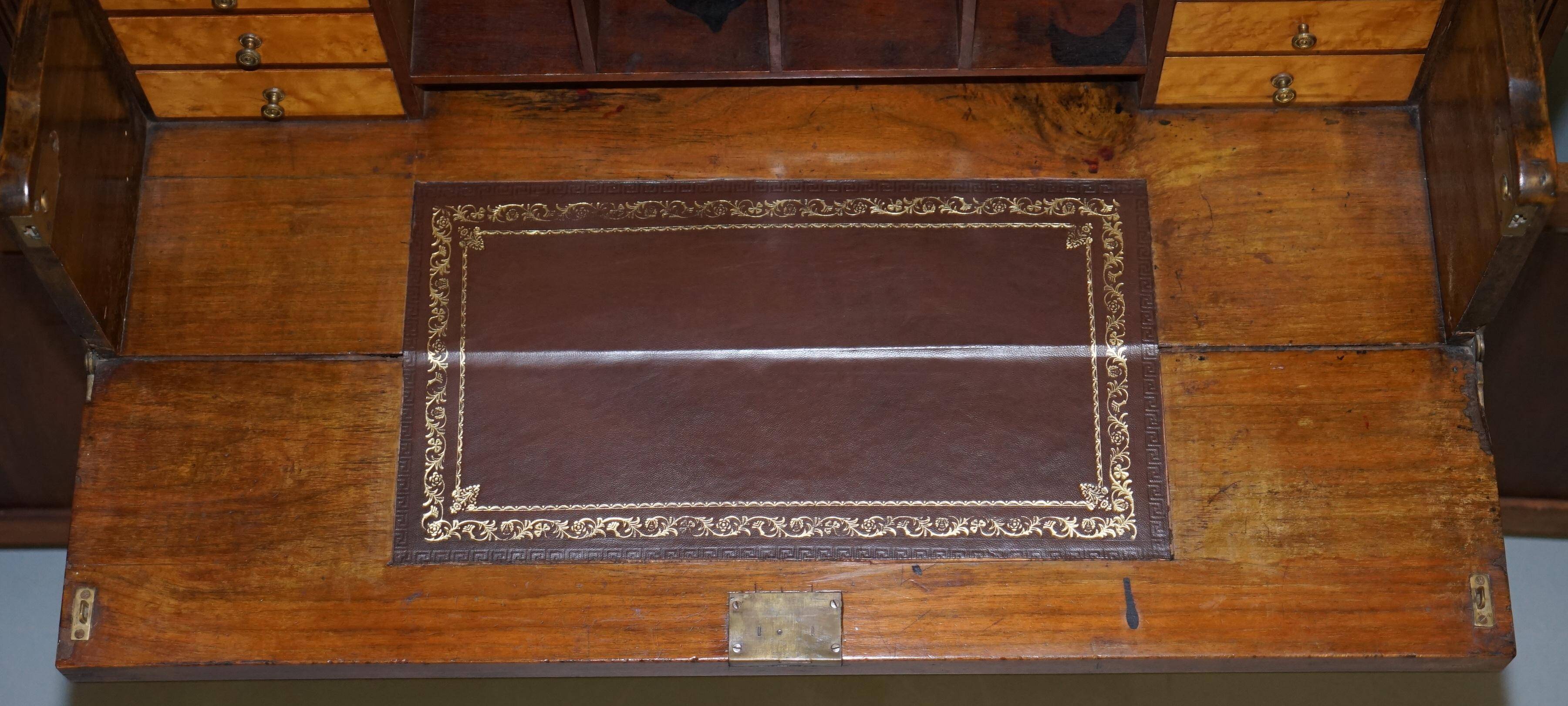 Light wood library with a secretary and leather surface.