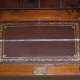 Light wood library with a secretary and leather surface.