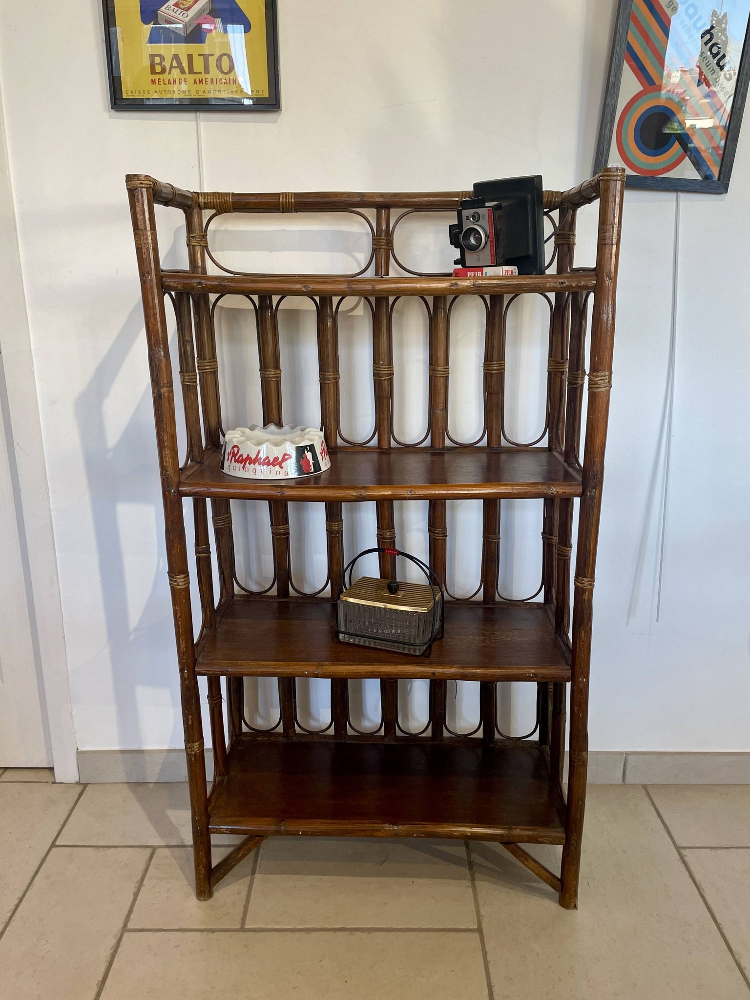 Shelf on rattan and bamboo legs from the 70s