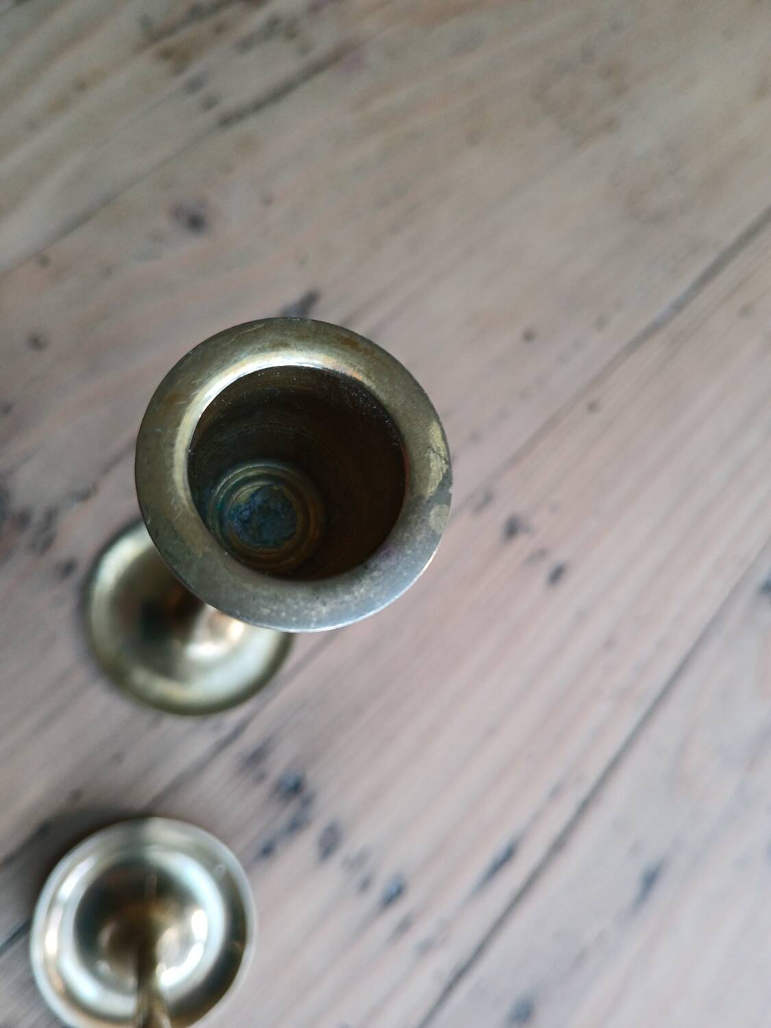 Set of two straight brass candlesticks.