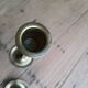 Set of two straight brass candlesticks.