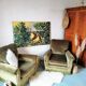 Paire de fauteuils en velours "Jean Roche "