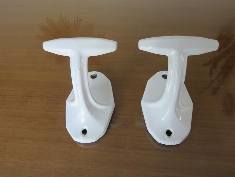 Pair of white cast iron patères art deco 30 40
