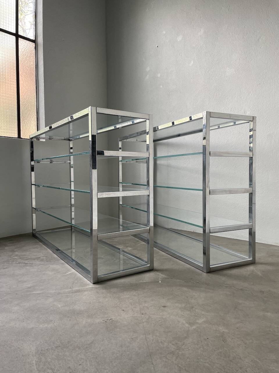 Pair of chrome and glass shelves from the 70s