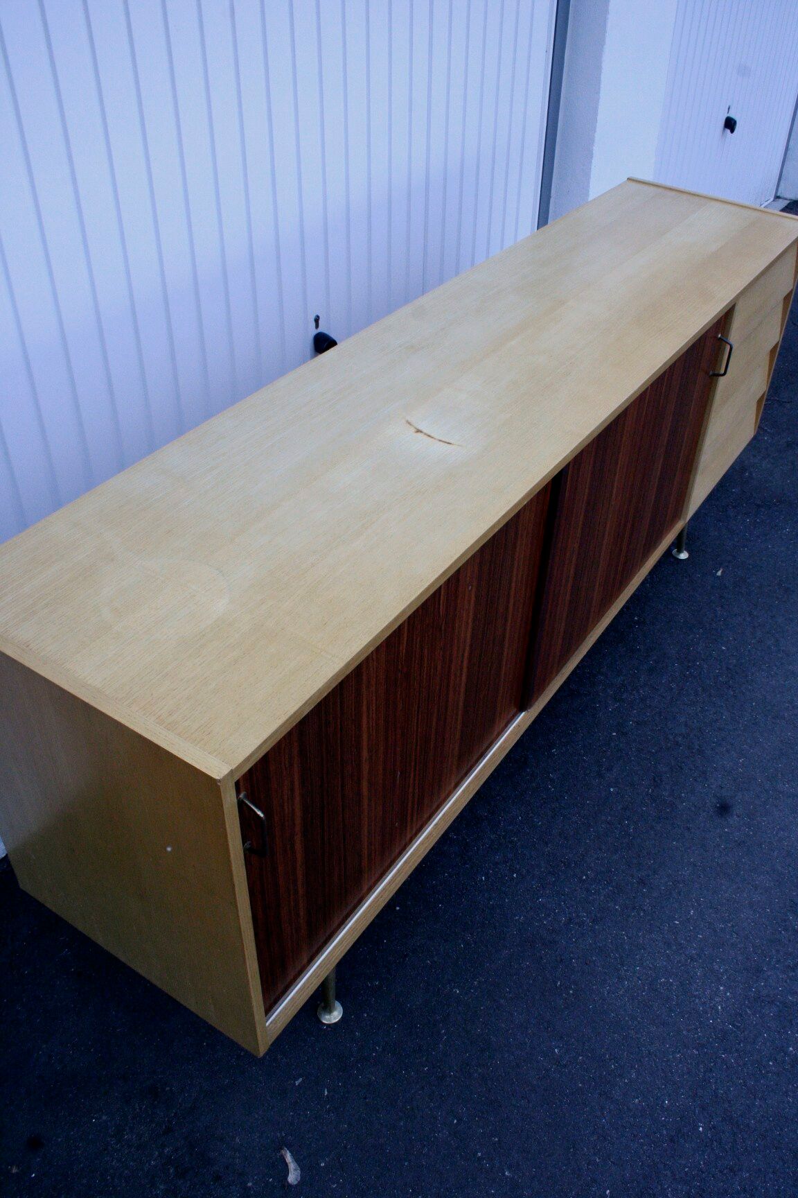 Midcentury sideboard with brass legs