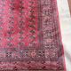 Large red Bokhara-style oriental carpet 300x200 cm with gul patterns.
