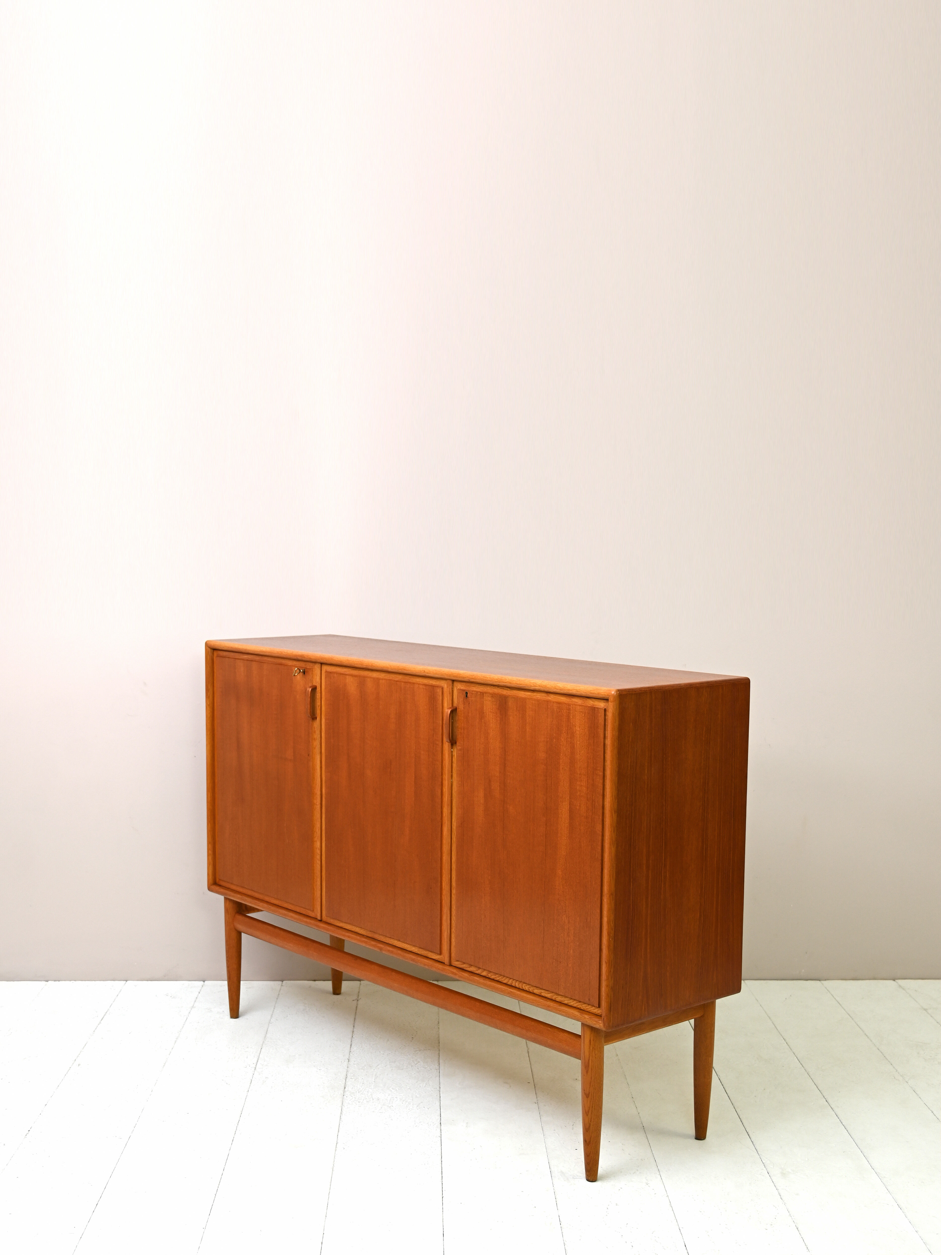 Scandinavian teak highboard with drawers
