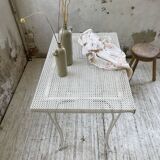 Perforated garden dining table