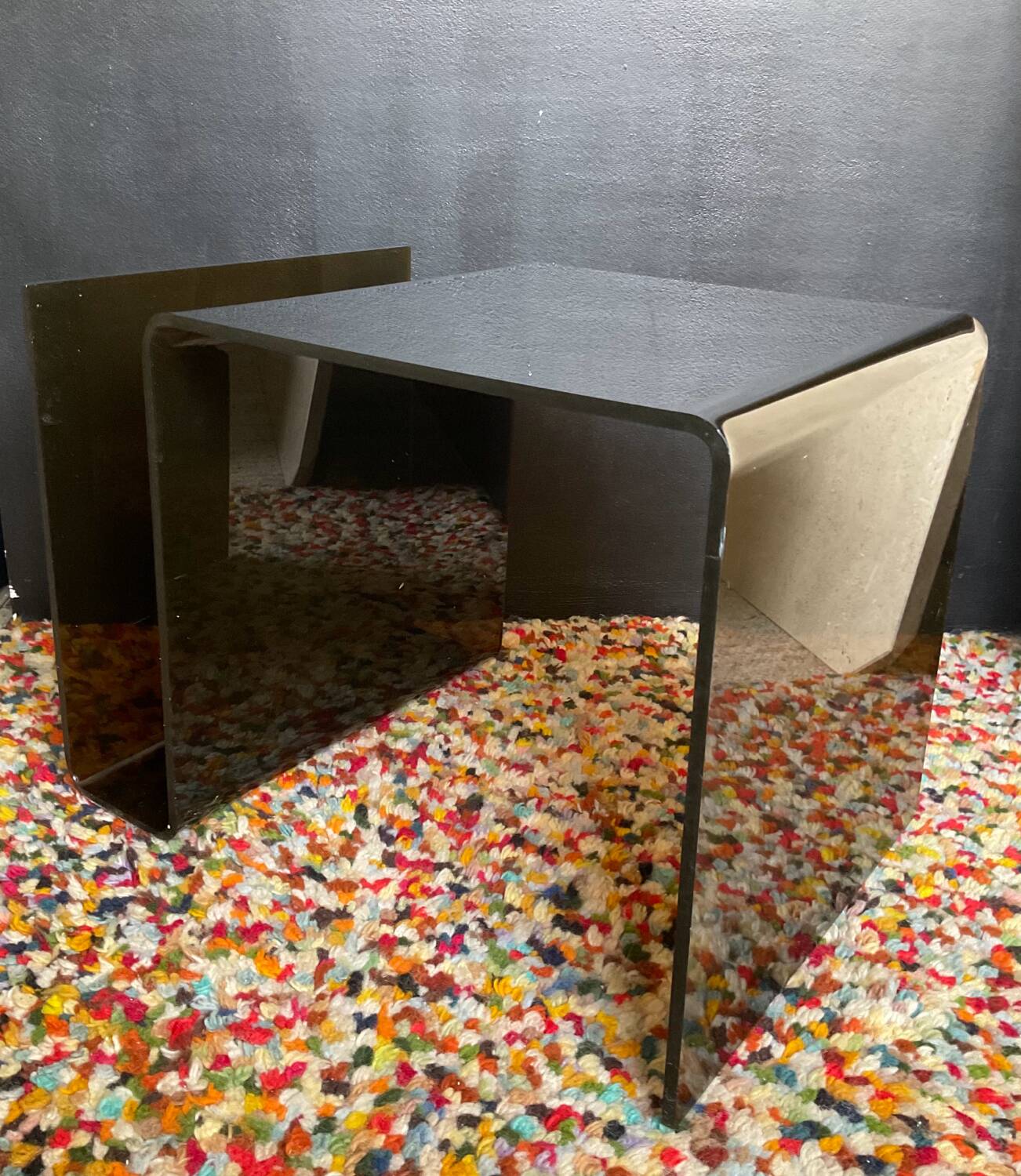 Smoked plexiglass magazine rack side table from the 70s