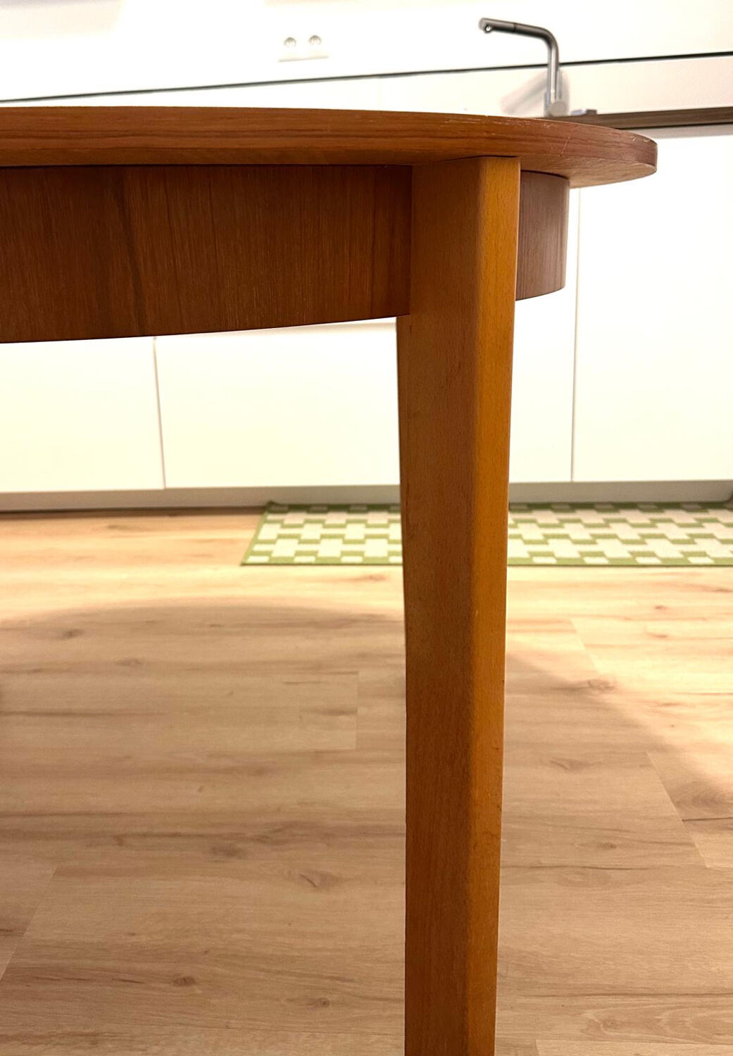 Wooden round table with butterfly extension from the 1970s.