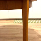 Wooden round table with butterfly extension from the 1970s.