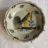 Plate of Nevers in earthenware late eighteenth century decoration of rooster on barrier