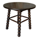Round wooden coffee table with turned legs.
