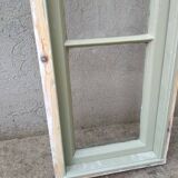 Old window mounted as a fenestron