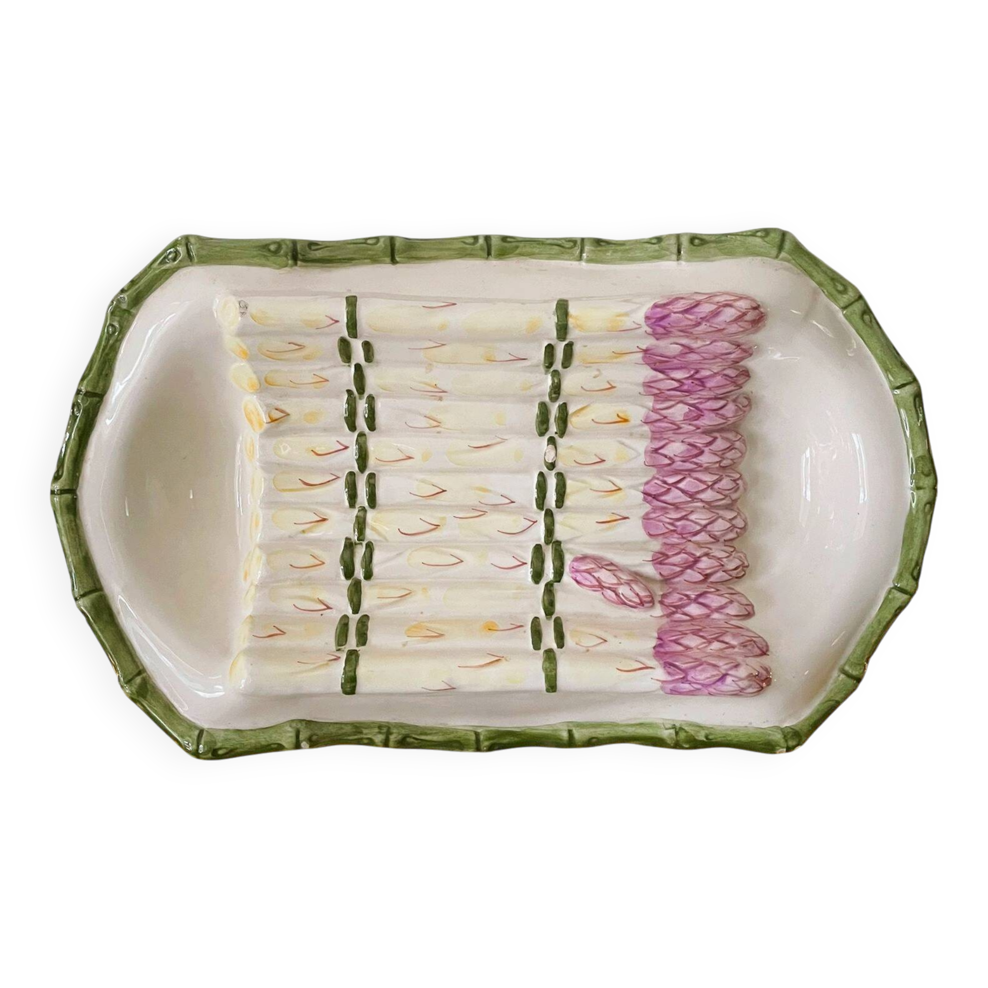 Plate of asparagus with a sauce.