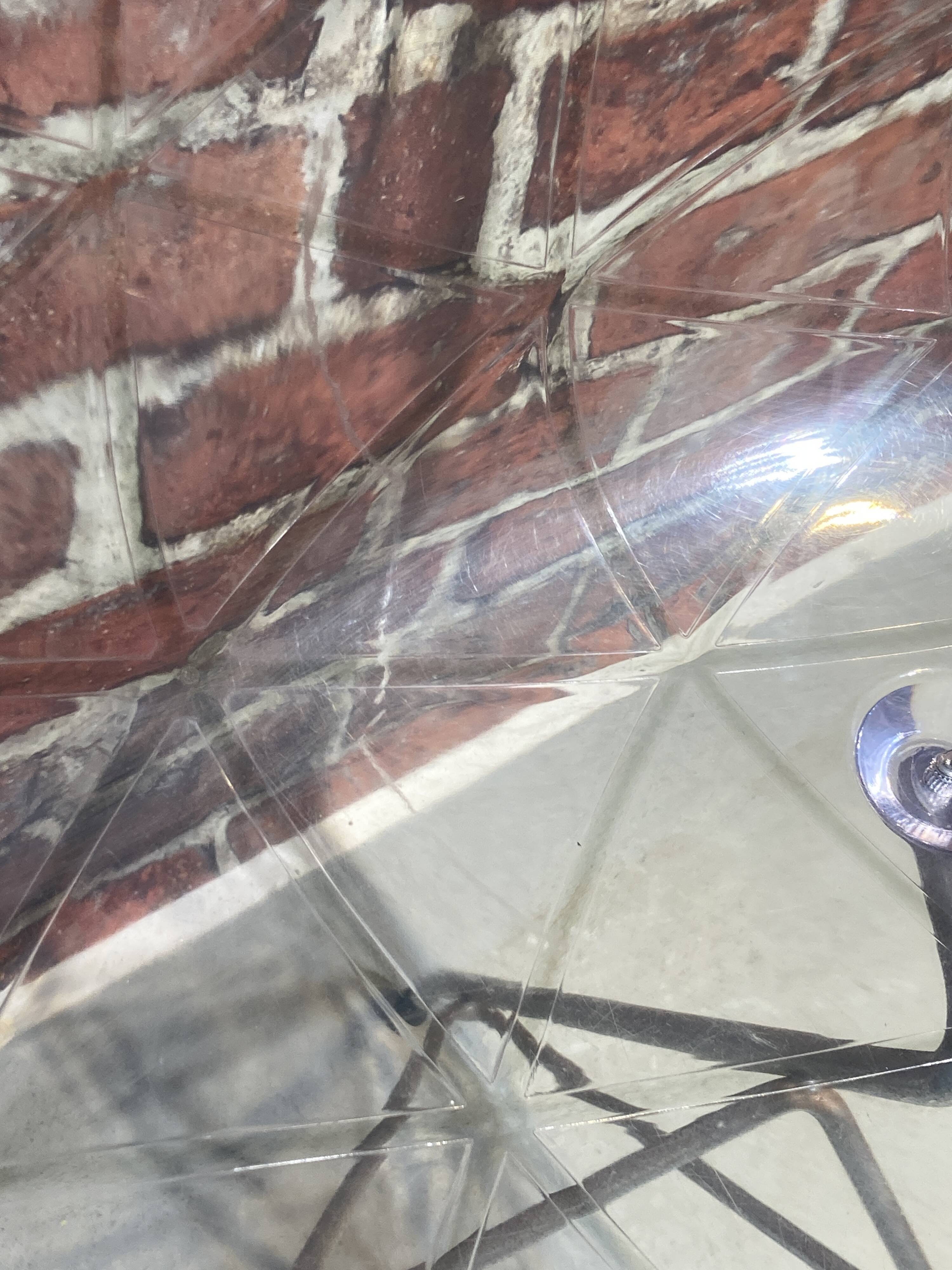 Set of four plexiglass and metal chairs