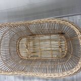 Rattan cradle on wheels