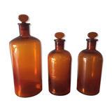 3 old pharmacy vials