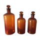 3 old pharmacy vials