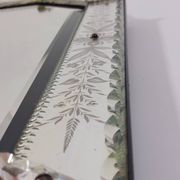 Venetian wall mirror in Murano glass with faceted floral decoration from the 1930s.