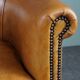 Club armchair in cognac-colored sheepskin