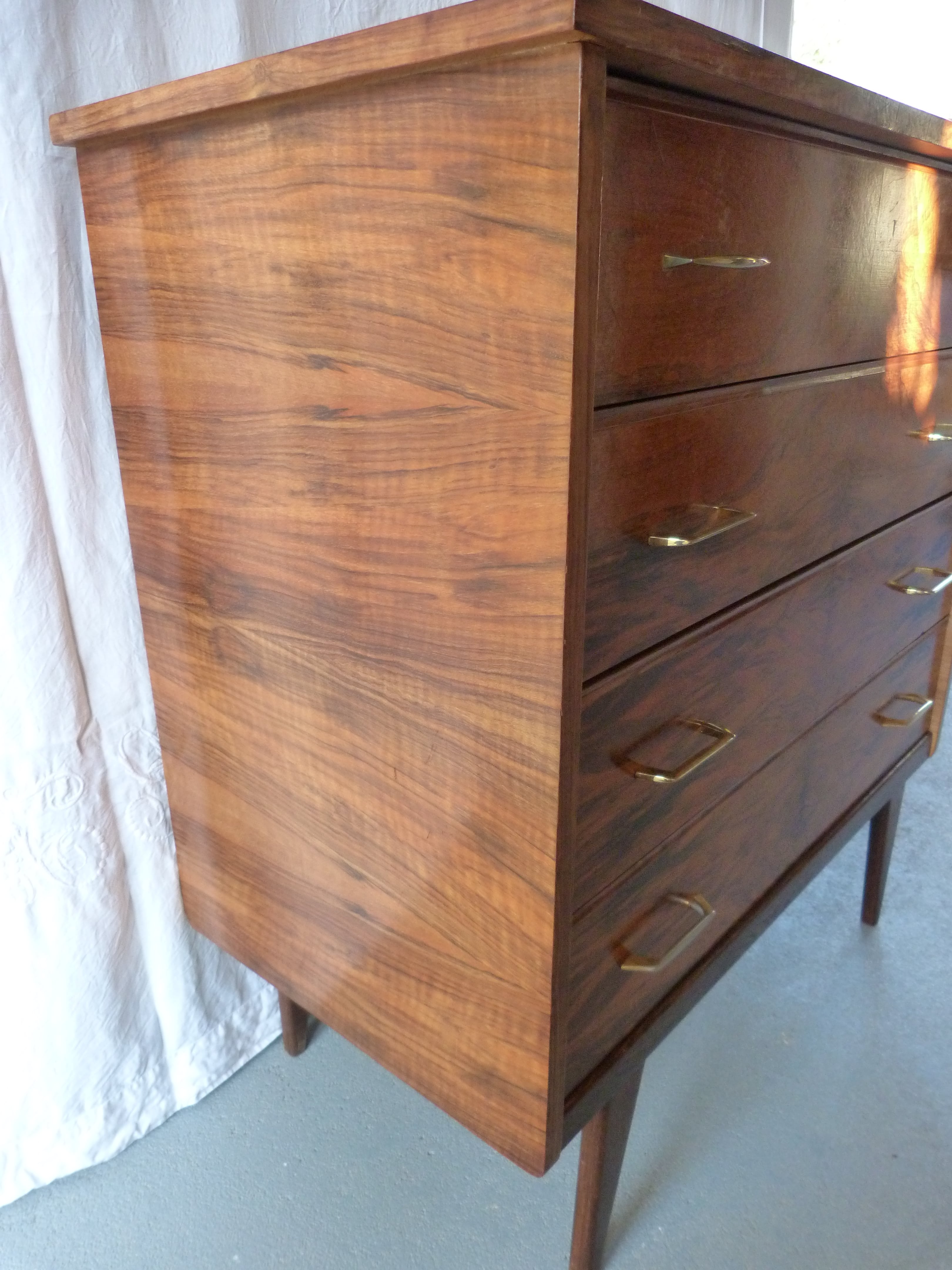 Compass feet chest of drawers