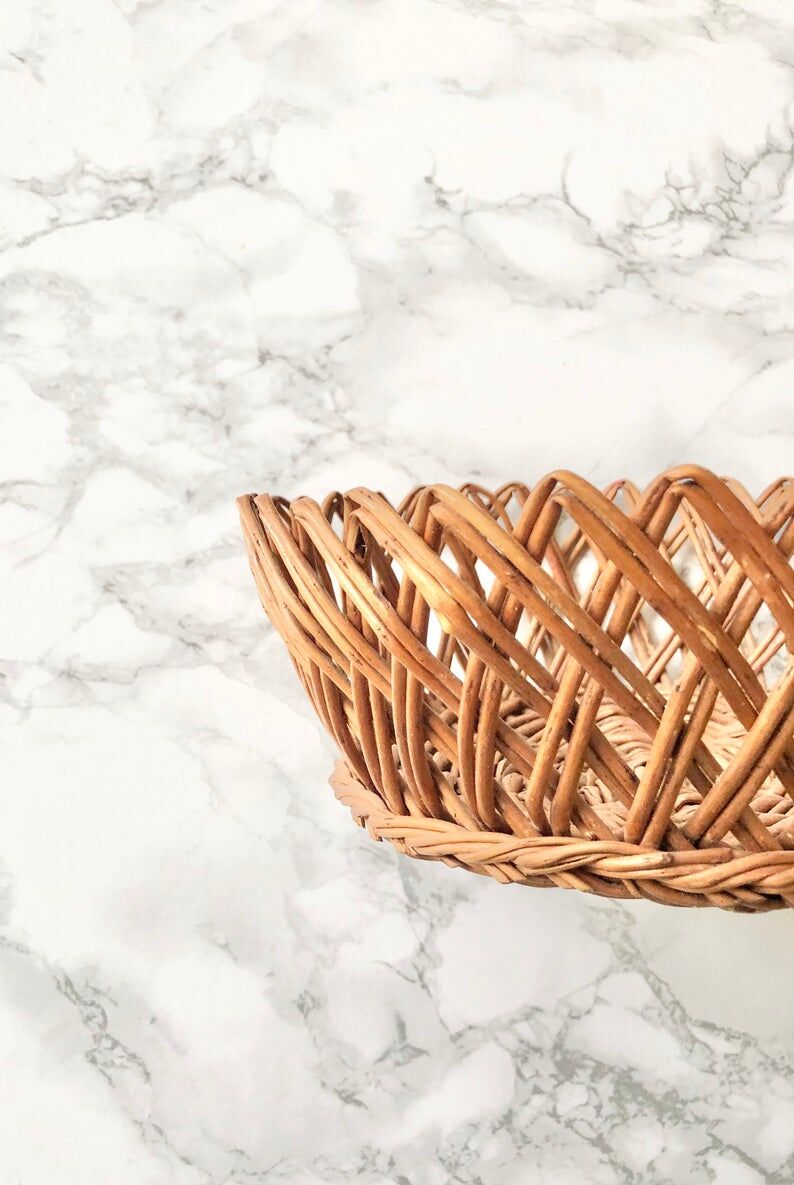 Old French toast or fruit basket in braided wicker