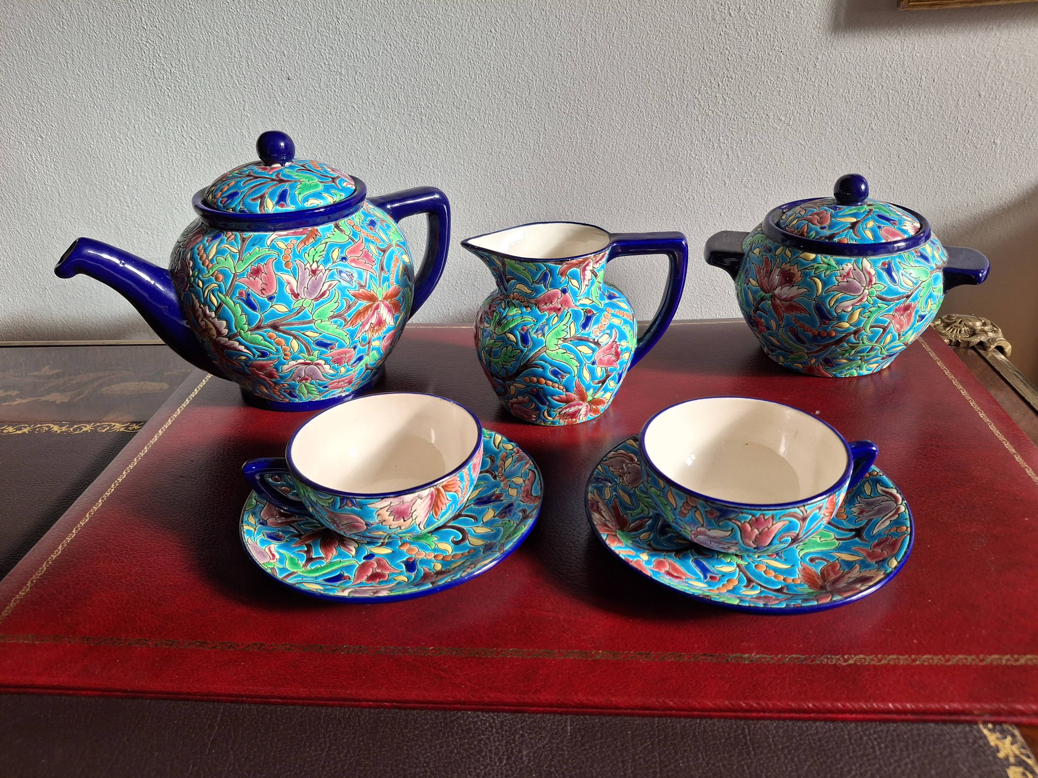 Cloisonné enamel tea service from Longwy in excellent condition.