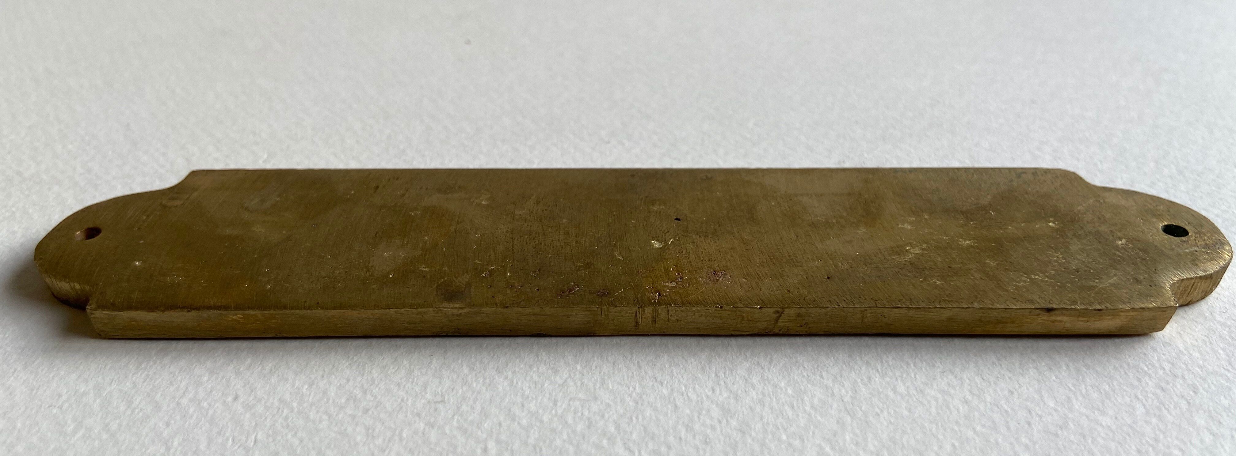 "Passengers" gold brass plate