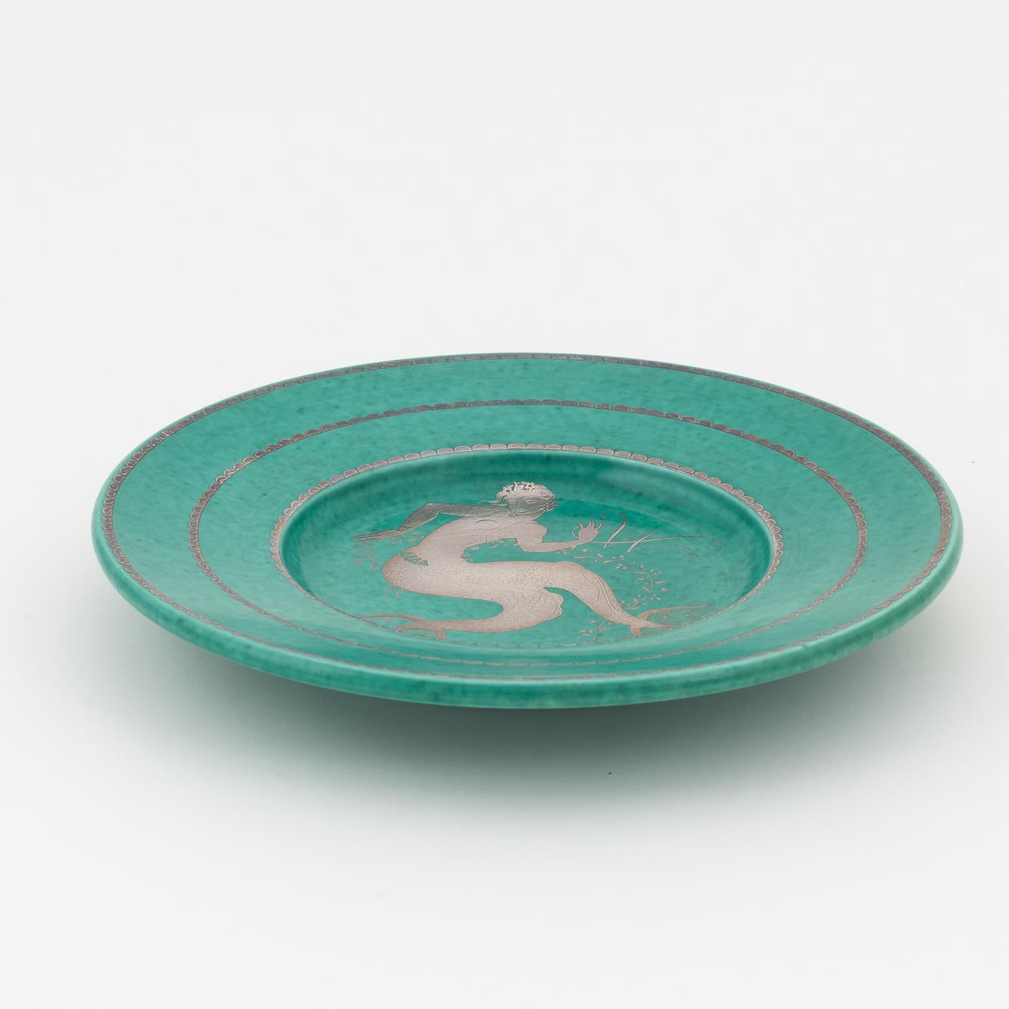 Plate by wilhelm kage "argenta" gustavsberg sweden 1944. signed and dated.