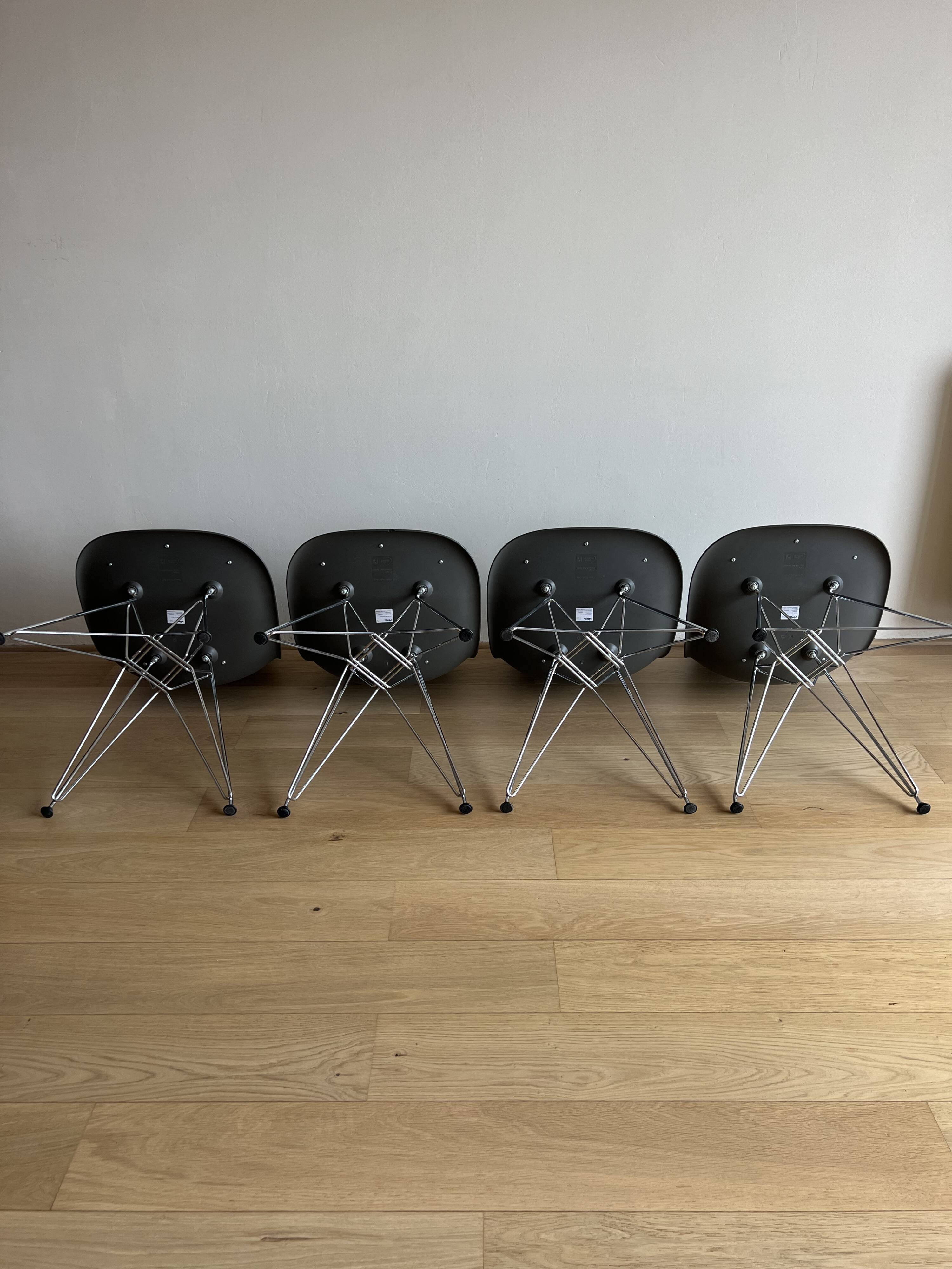 Lot of 4 original Eames DSR chairs by Vitra – with cushion.