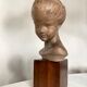 Child's head in terracotta 1920 wooden base