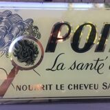 Plate fixed under advertising glass