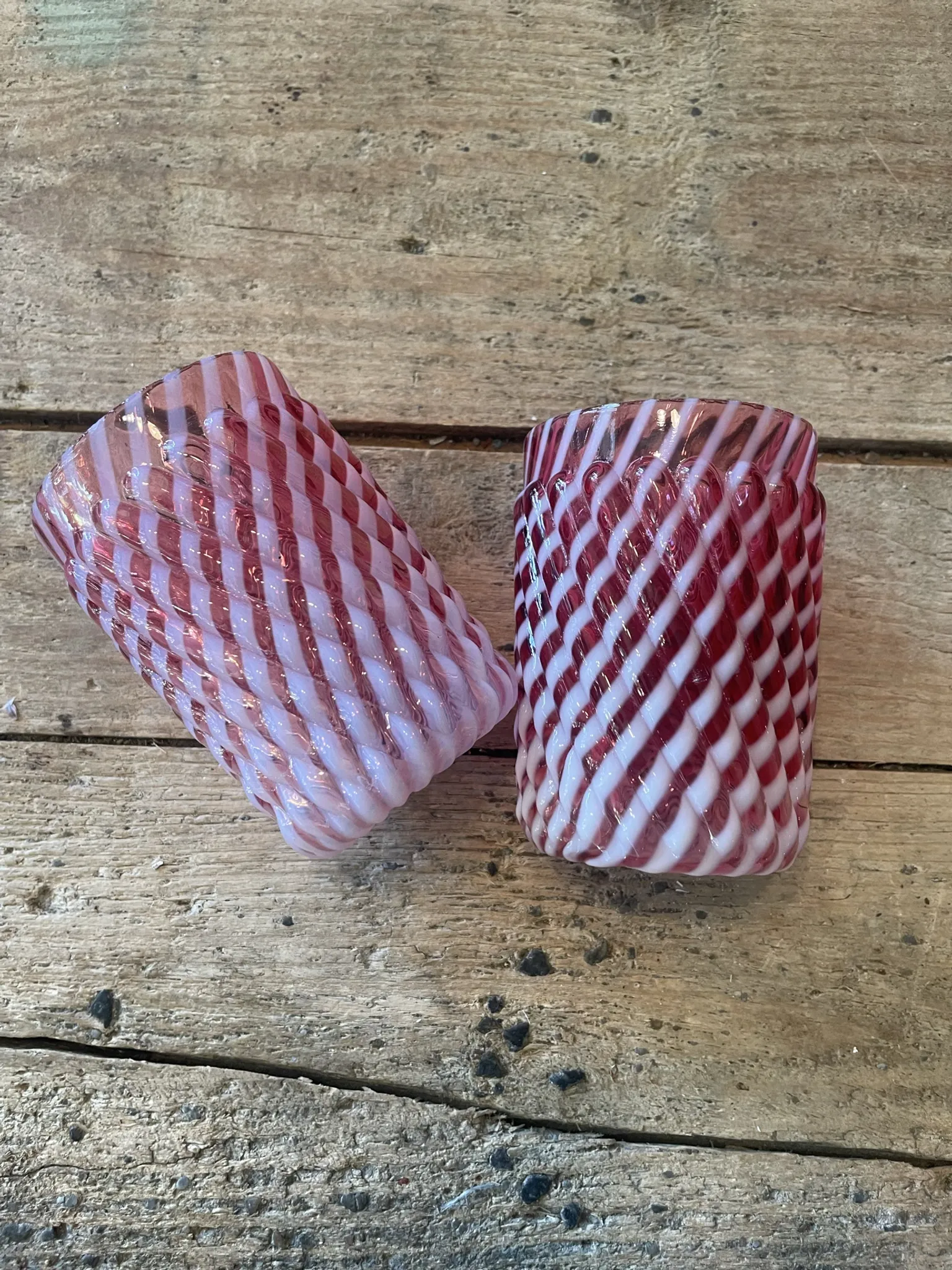 Two Northwood glasses from the 1930s in opalescent pink glass.