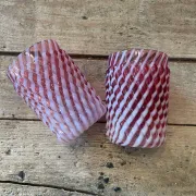 Two Northwood glasses from the 1930s in opalescent pink glass.
