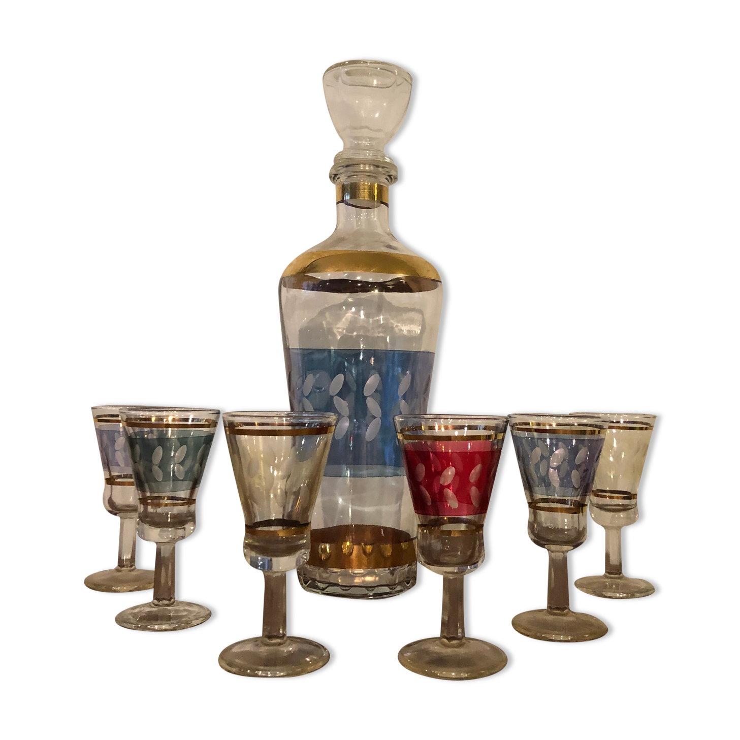 Liquor carafe and 6 assorted glasses