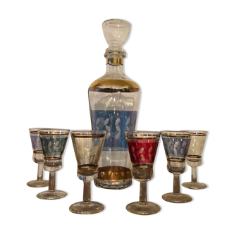 Liquor carafe and 6 assorted glasses