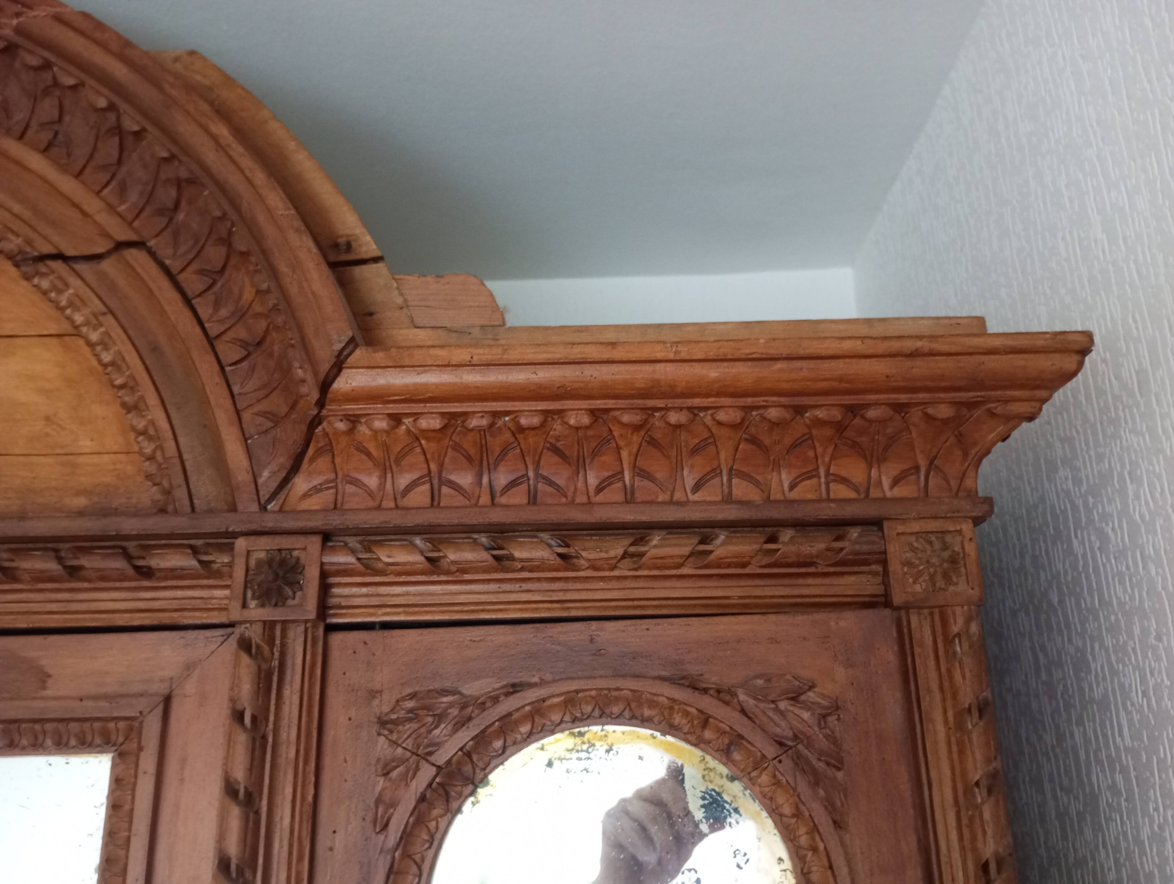 Old and large 3-door wardrobe