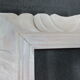 Cadre en bois sculpté- céruse blanche