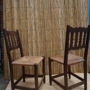 Pair of antique straw-seated farm chairs