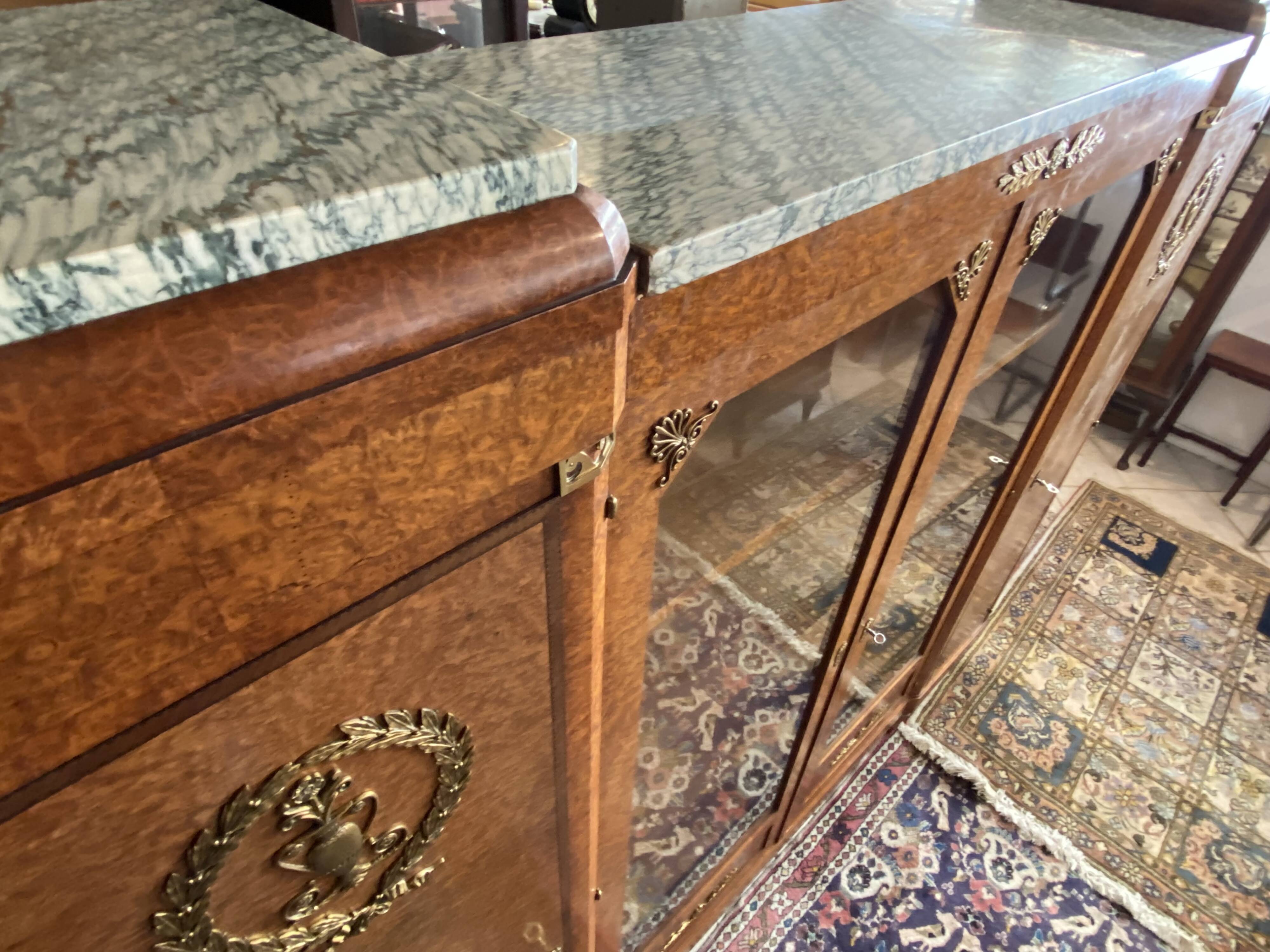 Showcase library in Neoclassical style, 1930, walnut burl and bronze.