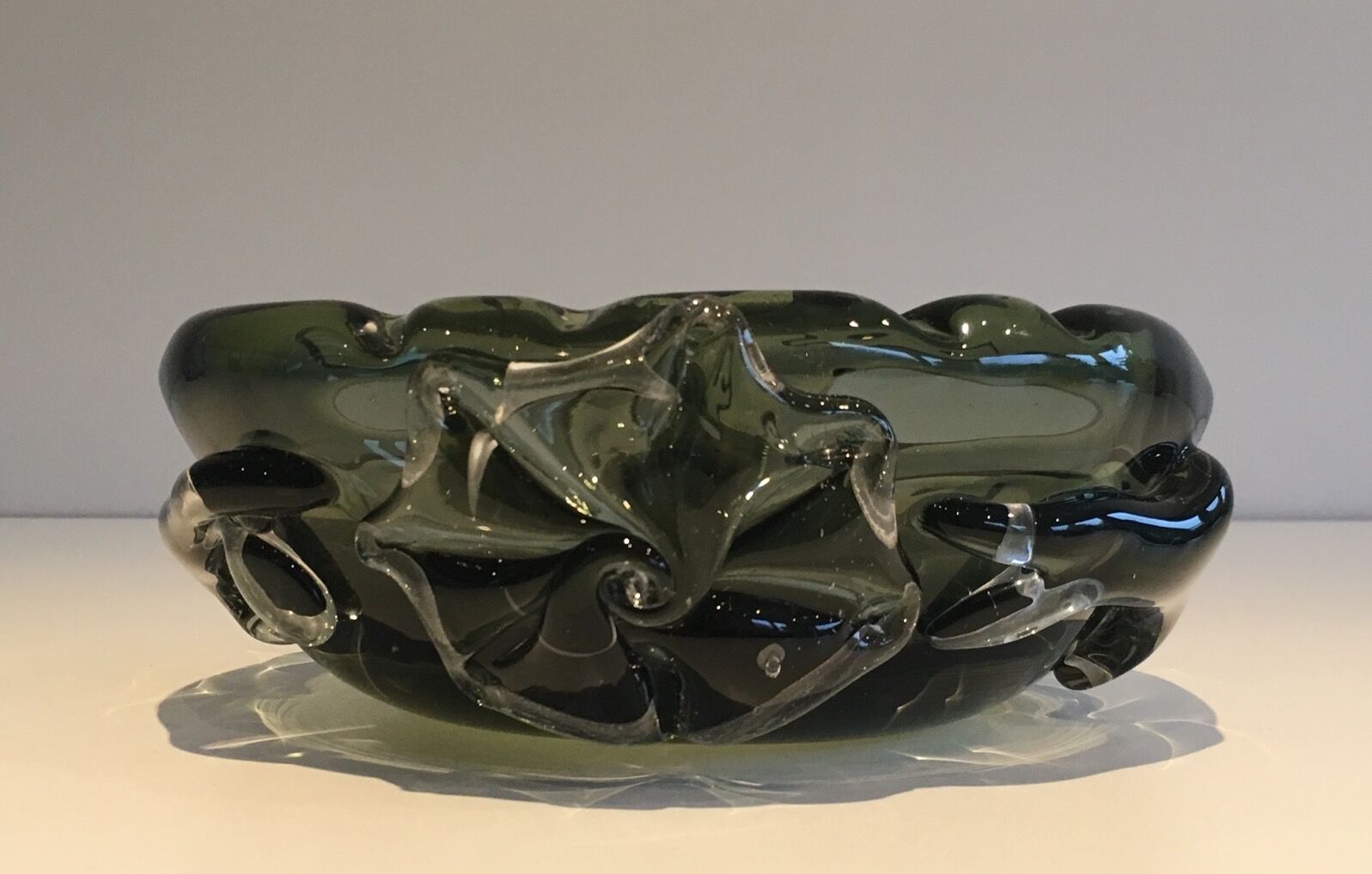 Cut glass smoked with decorations of sharks