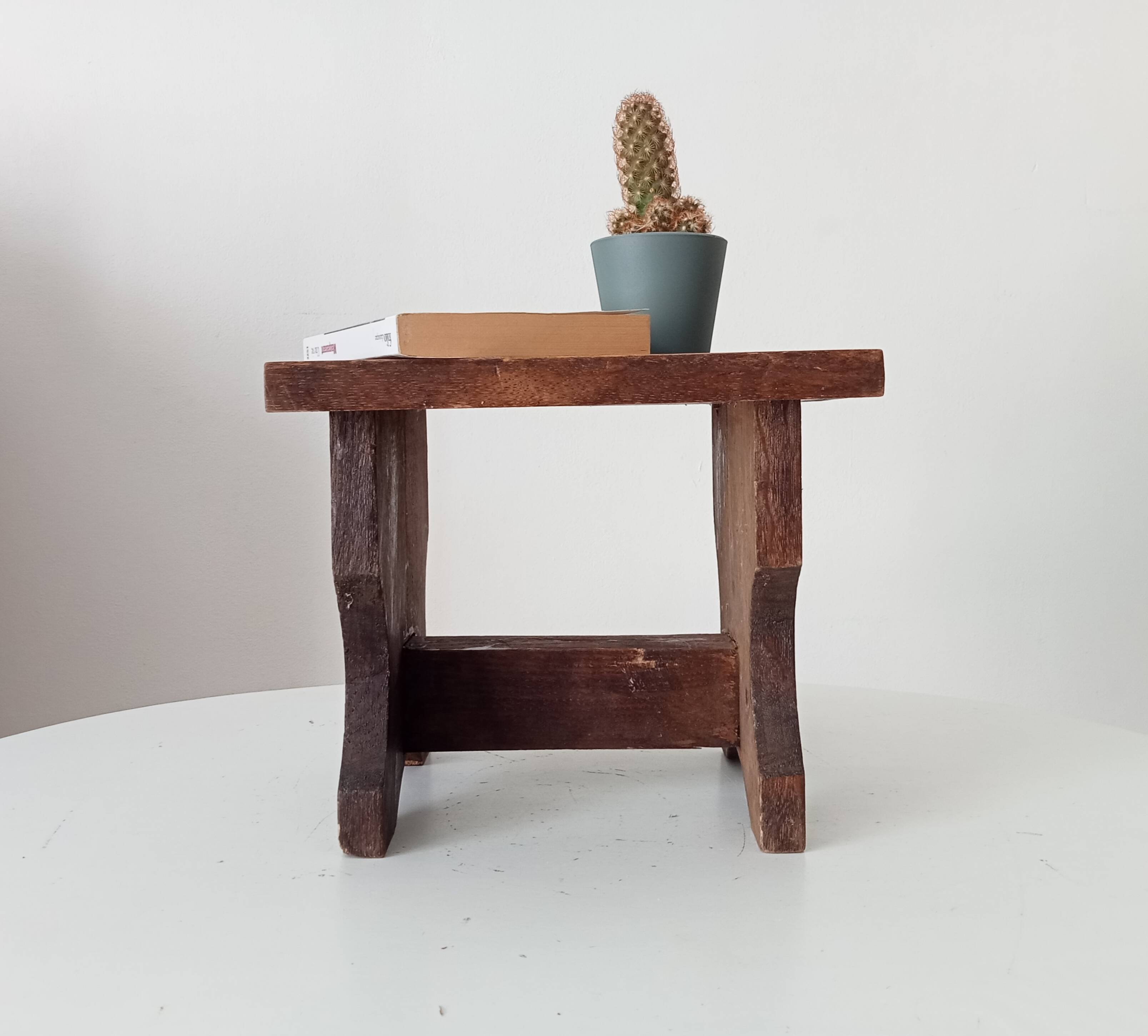 Ancient primitive milking stool